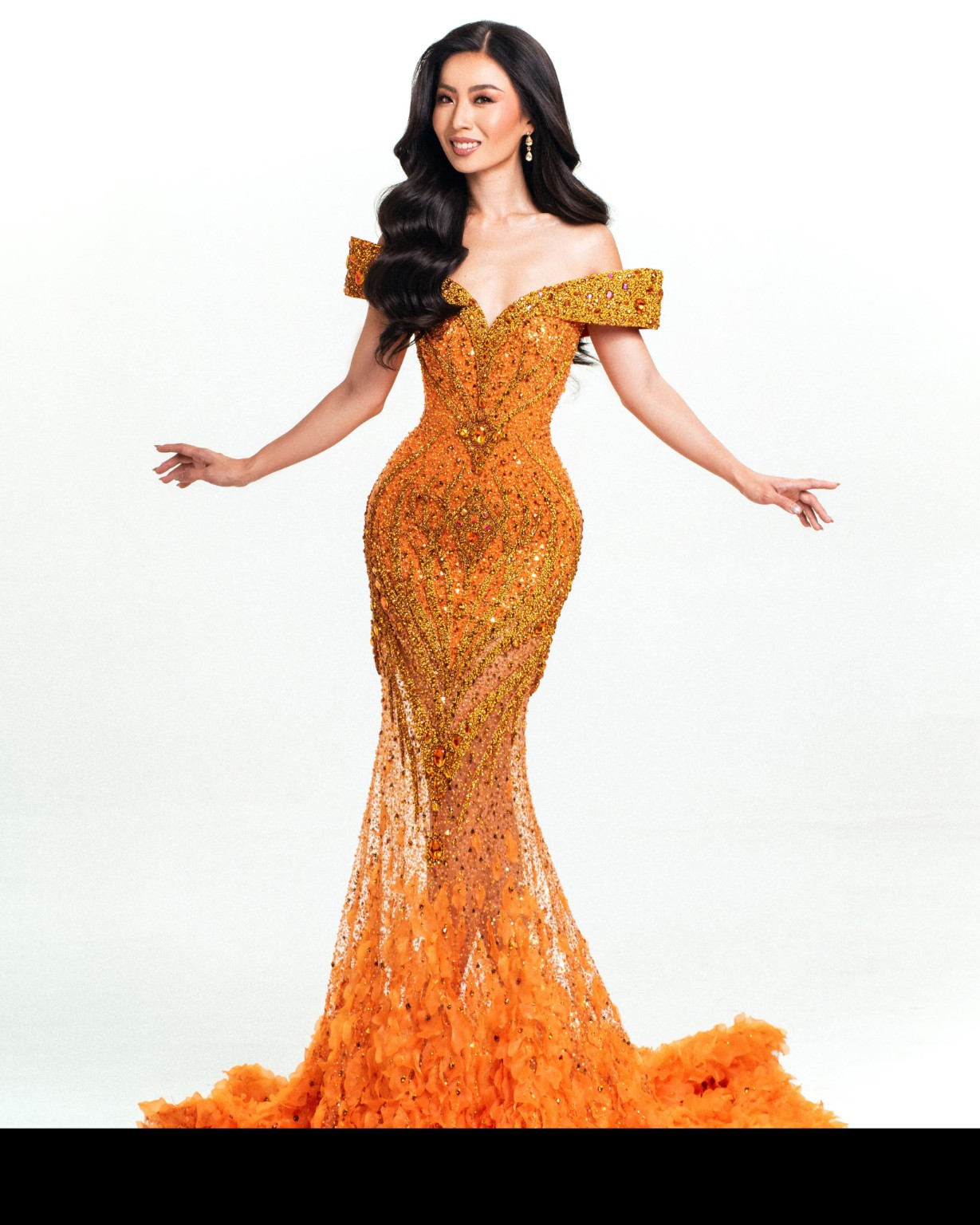 Scarlet Chua in an orange evening gown